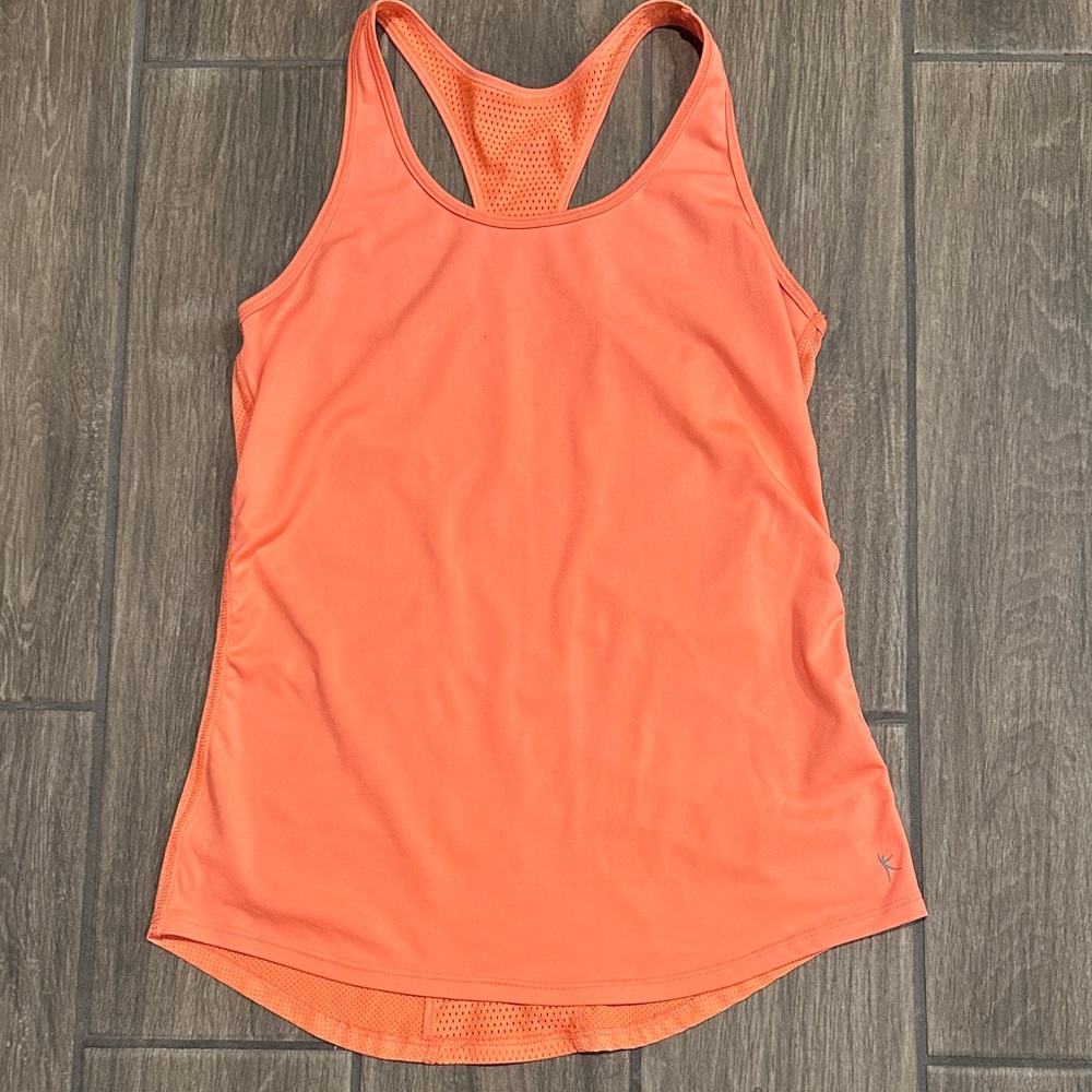 Danskin Now Women's Orange Racerback Tank Top, size small. Scoop hem, Dri more